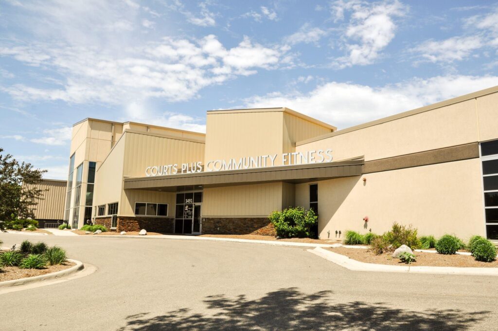 Exterior of Courts Plus Community Fitness community recreation and fitness center.