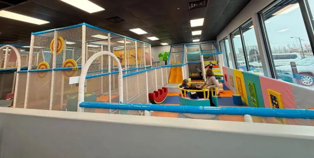 Indoor playground and soft play structure at Dreamland Indoor Playground with slides, climbing areas and toddler activities.